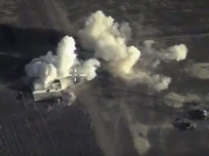 A handout frame grab taken from a video footage made available on the official website of the Russian Defence Ministry on 11 October 2015 shows an aerial view of bomb explosions at A fortified position, what Russia says was an Islamic State (ISIS or IS) terrorist ammunition depot after a strike carried out by Russian warplanes in Syrian territories. EPA/RUSSIAN DEFENCE MINISTRY PRESS SERVICE/HANDOUT BEST QUALITY AVAILABLE HANDOUT EDITORIAL USE ONLY/NO SALES