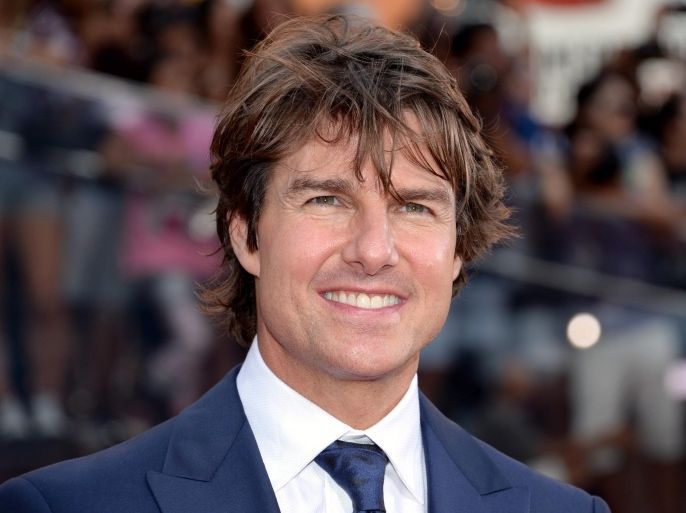 FILE - In this July 27, 2015 file photo, Tom Cruise attends the premiere of "Mission: Impossible - Rogue Nation" in Times Square in New York. A small plane assigned to the crew of a movie starring Cruise crashed in Colombia on Friday, Sept. 11, killing multiple people the country’s civilian aviation authority said. (Photo by Evan Agostini/Invision/AP, File)