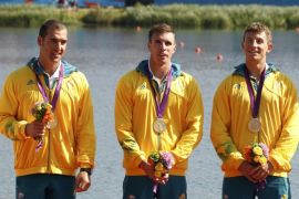 Australia's Tate Smith (L), David Smith (2nd L), Murray Stewart and Jacob Clear (R) stand with their medals during the victory ceremony for the men's kayak four (K4) 1000m event at Eton Dorney during the London 2012 Olympics Games August 9, 2012. They won the gold. REUTERS/Darren Whiteside (BRITAIN - Tags: SPORT CANOEING OLYMPICS TPX IMAGES OF THE DAY)
