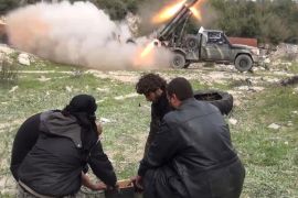 IDLIB, SYRIA - MARCH 09: Members of the anti-regimist Ahrar al-Sham brigade launch 'Grad missiles' during an operation against Syrian Regime forces deployed in the Latakia, from their base in Idlib, Syria on March 09, 2015.