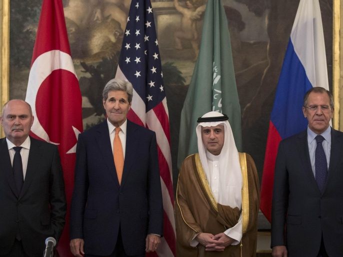 From left, Turkey's Minister of Foreign Affairs, Feridun Sinirlioglu, U.S. Secretary of State John Kerry, Saudi Arabia's Minister of Foreign Affairs Arabia Adel al-Jubeir and Russia's Foreign Minister Sergey Lavrov pose for a photo, during a meeting in Vienna, Friday, Oct. 23, 2015. Kerry and his Russian, Saudi and Turkish counterparts met in Vienna on Friday, seeking to revive a moribund effort to end Syria's civil war. Carlo Allegri/Pool Photo via AP)