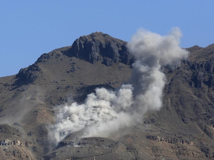Smoke rises after a Saudi-led airstrike hits a site believed to be a large weapons depot, on the outskirts of Yemen's capital, Sanaa, on Saturday, Oct. 10, 2015. (AP Photo/Hani Mohammed)