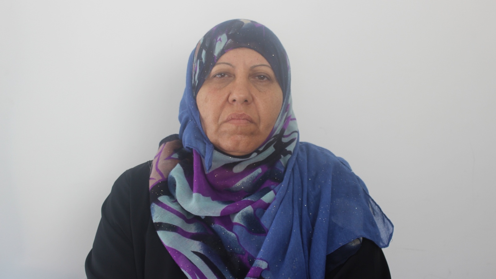 أم منيب مريضة بالسرطان توجهت من غزة للعلاج بمستشفى المطلع بالقدس(الجزيرة)