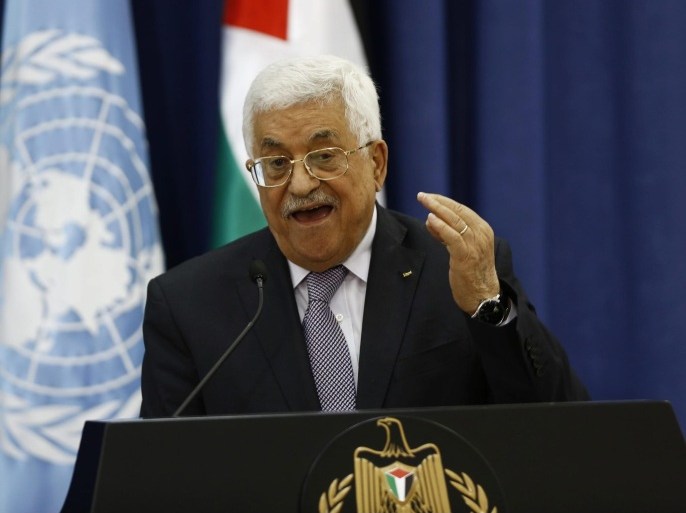 Palestinian President Mahmoud Abbas gestures during a press conference with UN Secretary-General Ban Ki-moon (not pictured) hold a press conference in the West Bank city of Ramallah, 21 October 2015. In a surprise emergency visit to the region, Ban urged Palestinians to stop knife attacks and violent protests, and Israel to stop security measures such as demolishing homes and erecting walls, acts that he warned would only add to Palestinian desperation and frustration.