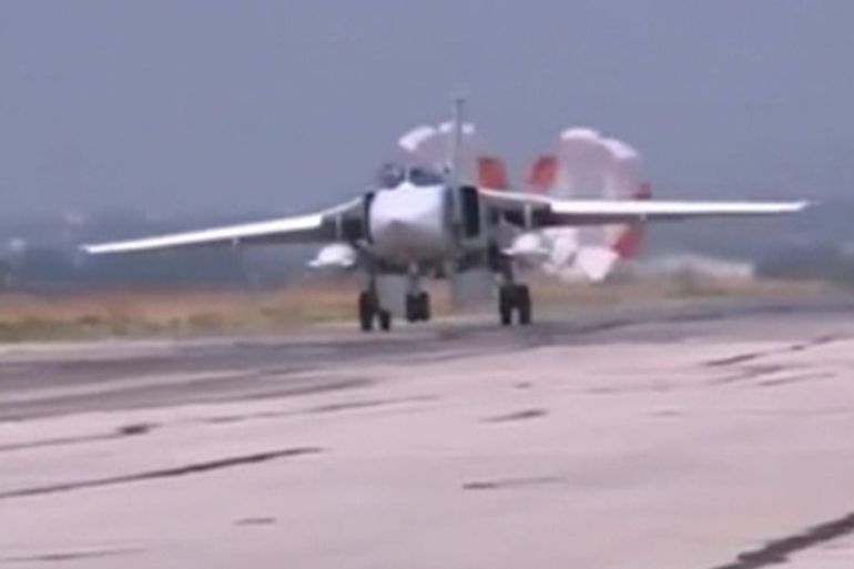 An image from video footage released by Russia's Defence Ministry October 5, 2015 shows a Russian air force Su-24 military jet slowing down after a sortie, at Heymim air base in Syria. More than 40 Syrian insurgent groups including the powerful Islamist faction Ahrar al-Sham have called on regional states to forge an alliance against Russia and Iran in Syria, accusing Moscow of occupying the country and targeting civilians. REUTERS/Ministry of Defence of the Russian Federation/Handout via Reuters ATTENTION EDITORS - FOR EDITORIAL USE ONLY. NOT FOR SALE FOR MARKETING OR ADVERTISING CAMPAIGNS. THIS IMAGE HAS BEEN SUPPLIED BY A THIRD PARTY. IT IS DISTRIBUTED, EXACTLY AS RECEIVED BY REUTERS, AS A SERVICE TO CLIENTS. REUTERS IS UNABLE TO INDEPENDENTLY VERIFY THE AUTHENTICITY, CONTENT, LOCATION OR DATE OF THIS IMAGE. FOR EDITORIAL USE ONLY. NOT FOR SALE FOR MARKETING OR ADVERTISING CAMPAIGNS. NO SALES.