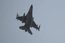 A Turkish Air Force fighter plane flies over the Incirlik Air Base, in Adana, southern Turkey, Thursday, Aug. 13, 2015. Fighter jets hovered above Incirlik air base Thursday a day after the U.S. announced it launched its first airstrikes against Islamic State group targets in Syria from the facility in southern Turkey. The move marked a limited escalation of a yearlong air campaign that critics have called excessively cautious. (AP Photo/Usame Ari/Cihan News Agency) TURKEY OUT