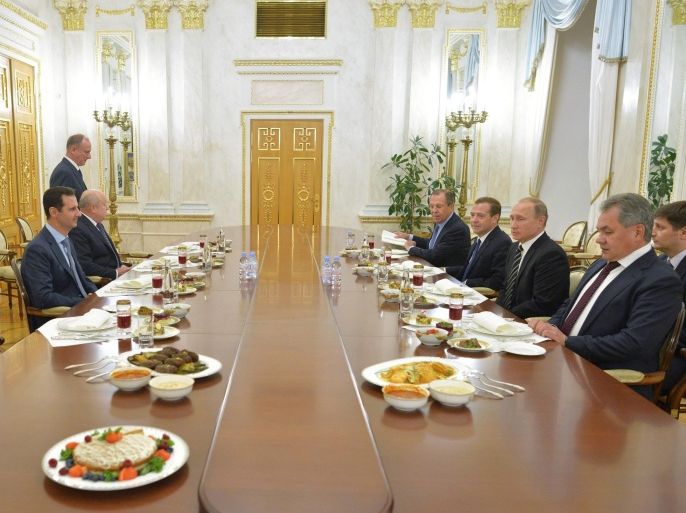 A picture made available on 21 October 2015 shows Syrian President Bashar al-Assad (2-L) attending a luncheon with Russian President Vladimir Putin (2-R), Russian Prime Minister Dmitry Medvedev (3-R), Russian Foreign Minister Sergei Lavrov, Russian Foreign Intelligence Chief Mikhail Fradkov (3-L), and Russian Defence Minister Sergei Shoigu (R) at the Kremlin in Moscow, Russia, 20 October 2015. Beleaguered Syrian President Bashar al-Assad travelled to Moscow for talks with his Russian counterpart Vladimir Putin, the Kremlin revealed on 21 October 2015. Assad and Putin discussed the situation in war-torn Syria on 20 October 2015 evening during the talks that had not been made public in advance, the Kremlin spokesman said. The talks dealt with the 'fight against terrorist extremist groups' and with Russian air support for attacks by Syrian troops on the ground. Russia has been carrying out airstrikes in Syria since the end of September. Moscow has declared the so-called Islamic State (IS or ISIS) as the main enemy, but Western nations have accused Moscow of attacking other groups opposed to the Assad regime.