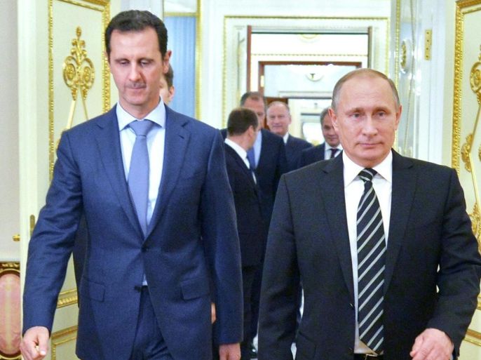 A picture made available on 21 October 2015 shows Russian President Vladimir Putin (R) and Syrian President Bashar al-Assad entering a hall during their meeting at the Kremlin in Moscow, Russia, 20 October 2015. Beleaguered Syrian President Bashar al-Assad travelled to Moscow for talks with his Russian counterpart Vladimir Putin, the Kremlin revealed on 21 October 2015. Assad and Putin discussed the situation in war-torn Syria on 20 October 2015 evening during the talks that had not been made public in advance, the Kremlin spokesman said. The talks dealt with the 'fight against terrorist extremist groups' and with Russian air support for attacks by Syrian troops on the ground. Russia has been carrying out airstrikes in Syria since the end of September. Moscow has declared the so-called Islamic State (IS or ISIS) as the main enemy, but Western nations have accused Moscow of attacking other groups opposed to the Assad regime. EPA/ALEXEY DRUZHINYN/RIA NOVOSTI/POOL ALTERNATIVE CROP
