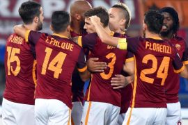 AS Roma's Miralem Pjanic (L) celebrates with his teammates after scoring the opening goal during the Italian Serie A soccer match between AS Roma and Udinese Calcio at the Olimpico stadium in Rome, Italy, 28 October 2015.