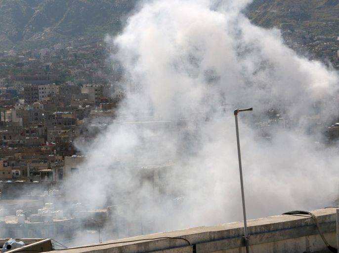 Smoke rises from ordinance fired by Shiite rebels known as Houthis during clashes with tribal fighters, in Taiz, Yemen, Sunday, Oct. 25, 2015. Yemen's fighting pits the Houthis and allied army units against forces loyal to the internationally recognized government as well as southern separatists and other militants. The U.N. says at least 2,577 civilians were killed since the Saudi-led air campaign began in March, while 5,078 have been injured. (AP Photo/Abdulnasser Alseddik)