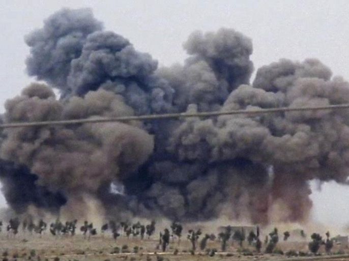 In this image made from video provided by Hadi Al-Abdallah, which has been verified and is consistent with other AP reporting, smoke rises after airstrikes in Kafr Nabel of the Idlib province, western Syria, Thursday, Oct. 1, 2015. Russian jets carried out a second day of airstrikes in Syria Thursday, but there were conflicting claims about whether they were targeting Islamic State and al-Qaeda militants or trying to shore up the defenses of President Bashar Assad. (Hadi Al-Abdallah via AP)