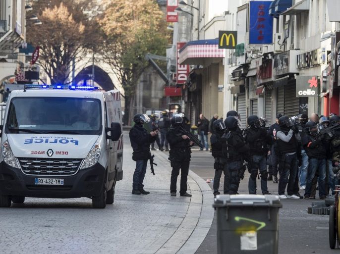 In this photo released Friday Nov. 20, 2015, by the French Interior Ministry, showing Police security forces during the raid in Saint-Denis region of Paris, France, on Wednesday Nov. 18 2015. French security forces stormed a building in the early hours of Wednesday Nov. 18, in Saint Denis, Paris, where the mastermind of the Nov. 13, Paris attacks Abdelhamid Abaaoud, was believed to be hiding, resulting in a shoot-out.(Jerome Groisard / Ministere de l'Interieur – Dicom via AP)