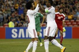 UAE's Ahmed Khalil (R) celebrates his goal with team mate Omar Abdulrahman during their Asian Cup third-place playoff soccer match against Iraq at the Newcastle Stadium in Newcastle January 30, 2015. REUTERS/Edgar Su (AUSTRALIA - Tags: SOCCER SPORT)
