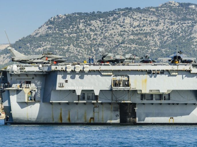 A handout picture provided by the Marine Nationale Francaise (French Navy) on 20 November 2015 shows the Battle Group (GAN) aka Task Force 473, formed around the aircraft carrier Charles de Gaulle, leaving its base in Toulon, France, 18 November 2015. French nuclear aircraft carrier Charles De Gaulle will be deployed as part of the Arromanches 2 mission in the Persian Arabian Gulf against Islamic State (IS or ISIS) in Syria and Iraq. EPA/SEBASTIEN CHENAL/MARINE NATIONALE/HANDOUT EPA/SEBASTIEN CHENAL/MARINE NATIONALE/HANDOUT