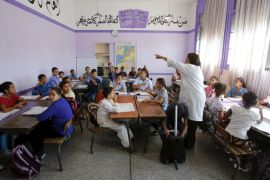 Schoolchildren listen to a teacher as they study during a class in the Oudaya primary school in Rabat, September 15, 2015, at the start of the new school year in Morocco. Nearly three years after Taliban gunmen shot Pakistani schoolgirl Malala Yousafzai, the teenage activist last week urged world leaders gathered in New York to help millions more children go to school. World Teachers' Day falls on 5 October, a Unesco initiative highlighting the work of educators struggling to teach children amid intimidation in Pakistan, conflict in Syria or poverty in Vietnam. Even so, there have been some improvements: the number of children not attending primary school has plummeted to an estimated 57 million worldwide in 2015, the U.N. says, down from 100 million 15 years ago. Reuters photographers have documented learning around the world, from well-resourced schools to pupils crammed into corridors in the Philippines, on boats in Brazil or in crowded classrooms in Burundi. REUTERS/Youssef BoudlalPICTURE 40 OF 47 FOR WIDER IMAGE STORY "SCHOOLS AROUND THE WORLD"SEARCH "EDUCATORS SCHOOLS" FOR ALL IMAGES