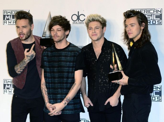 Members of the British-Irish band One Direction pose with their awards for Artist of the Year and Favorite Duo or Group - Pop Rock in the press room at the 2015 American Music Awards at the Microsoft Theater in Los Angeles, California, USA, 22 November 2015.