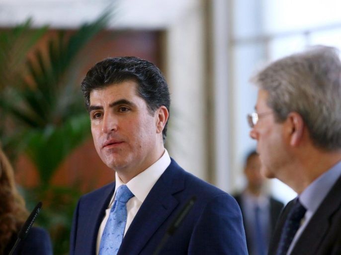 Italian Foreign Minister Paolo Gentiloni (R) looks at Nechirvan Barzani, Prime Minister of Iraq's Kurdistan regional government, as they hold a joint news conference following their talks at Farnesina Palace in Rome, Italy, 03 March 2015.