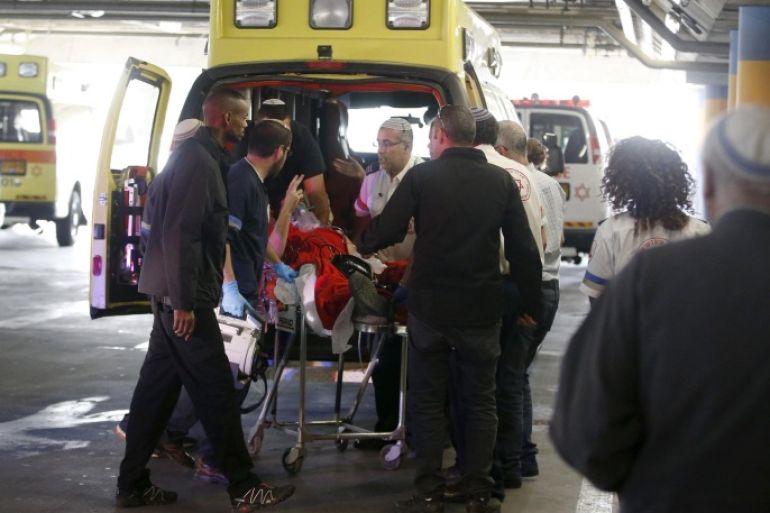 An Israeli man, wounded in what the Israeli army said was a suspected Palestinian stabbing attack in the West Bank, is evacuated to a hospital in Jerusalem November 25, 2015. REUTERS/Ronen Zvulun
