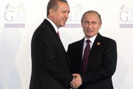 Turkey’s President Recep Tayyip Erdogan, left, greets Russia’s President Vladimir Putin as he arrives for the G-20 Summit in Antalya, Turkey, Sunday, Nov. 15, 2015. (Sergei Guneyev/RIA Novosti, Kremlin Pool Photo via AP)