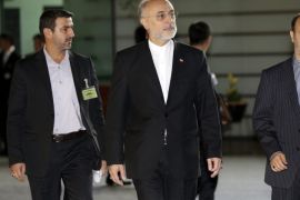 Ali Akbar Salehi (C), Head of the Atomic Energy Organization of Iran (AEOI), is escorted to the venue where he meets Japanese Prime Minister Shinzo Abe (not pictured) prior to their meeting at Abe's official residence in Tokyo, Japan, 05 November 2015.