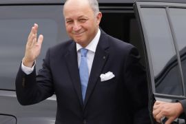 French Foreign Minister Laurent Fabius waves during his arrival to meet with Brazil’s President Dilma Rousseff, at the Alvorada Palace, in Brasilia, Brazil, Sunday, Nov. 22, 2015. Fabius is in the country to hold talks with top Brazilian leaders ahead of the climate change conference in Paris. (AP Photo/Eraldo Peres)