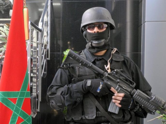 Members of the Moroccan special forces stand guard during a press conference delivered by Governor Abdelhak Khiam of Central Desk of Investigation Judicial (BCIJ) in Rabat, Morocco, 23 March 2015. Moroccan authorities said it dismantled a terrorist cell and seized weapons in a nationwide operation targeting supporters of the Islamic State jihadist group.