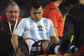 Argentina's Sergio Aguero is carried off the filed after an injury during a 2018 Russia World Cup qualifying soccer match against Ecuador in Buenos Aires, Argentina, Thursday, Oct. 8, 2015. (AP Photo/Natacha Pisarenko)