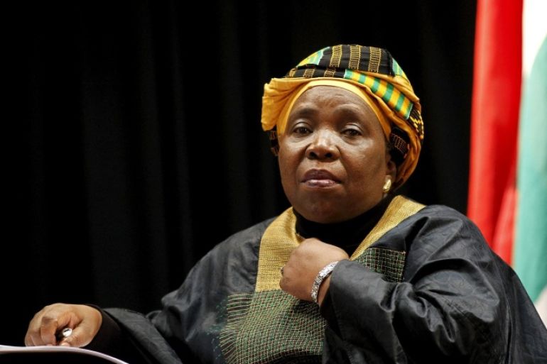 New African Union Commission chief Nkosazana Dlamini-Zuma looks on before delivering a lecture in Pretoria, in this July 29, 2012 file photo. A hotly contested party vote earlier this month has deepened divisions within South Africa's ruling African National Congress and stirred debate over President Jacob Zuma's successor. His ex-wife, African Union head Nkosazana Dlamini-Zuma, has just edged ahead of the front-runner, deputy president Cyril Ramaphosa, after a vote in the ANC's Zulu heartland swung in her favour, exposing rifts in the ruling alliance with the South African Communist Party (SACP) and trade union group, COSATU. Zuma, who is expected to stay president until a 2019 election and is likely to be influential behind the scenes in picking a new ANC leader at a conference in 2017, is expected to support Dlamini-Zuma. REUTERS/Siphiwe Sibeko/Files