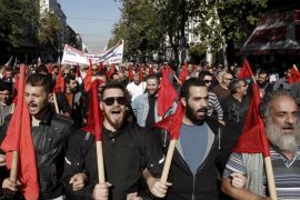Protesters from the Communist-affiliated trade union PAME take part in an anti-austerity demonstration during a 24-hour general strike in central Athens, Greece November 12, 2015. Domestic flights will be grounded, ships will remain docked at ports and public offices will shut on Thursday as Greeks walk off the job to protest austerity measures demanded by international lenders in exchange for fresh bailout funds. REUTERS/Michalis Karagiannis