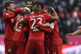 CST012 - Munich, Bavaria, GERMANY : Bayern Munich players celebrate after the second goal during the German first division Bundesliga football match FC Bayern Munich vs Hertha Berlin in Munich, southern Germany, on November 28, 2015. AFP PHOTO / CHRISTOF STACHE
