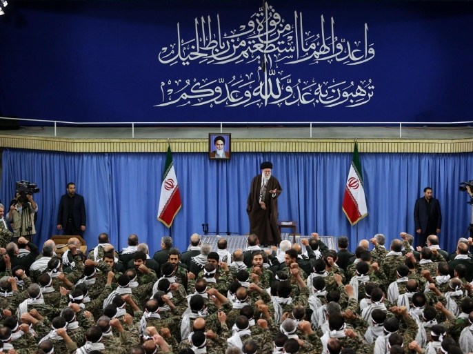 In this Wednesday, Nov. 25, 2015 photo released by an official website of the office of the Iranian supreme leader, Supreme Leader Ayatollah Ali Khamenei gestures during a meeting with commanders of paramilitary division of the elite Revolutionary Guard in Tehran. Iran's top leader says the United States is using "money and sex" to try to infiltrate the Islamic Republic and warns Iranians not to fall into the "enemy's trap." (Office of the Iranian Supreme Leader via AP)