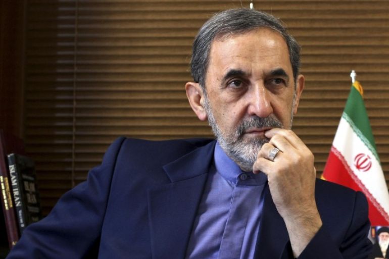 FILE - In this Sunday, Aug. 18, 2013, file photo, Ali Akbar Velayati, a top adviser to Iran's supreme leader Ayatollah Ali Khamenei, gives an interview to The Associated Press at his office, in Tehran, Iran. Velayati accused of masterminding Argentina's worst terrorist attack said Monday, May 18, 2015, that he is innocent and dismissed the accusations against him as baseless. The 1994 bombing of the AMIA Jewish community center that killed 85 people remains unsolved. Former Iranian officials have been on an Interpol capture list for years, but Argentine prosecutors have never been able to question them, and Iran has long denied any role in the bombing. (AP Photo/Ebrahim Noroozi, File)