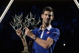 MS755 - Paris, Paris, FRANCE : Serbia's Novak Djokovic poses with the trophy after winning the final tennis match against Britain's Andy Murray at the ATP World Tour Masters 1000 indoor tennis tournament in Paris on November 8, 2015. AFP PHOTO / MIGUEL MEDINA