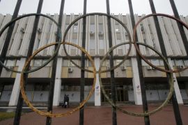 A view through a fence shows the Russian Olympic Committee headquarters, which also houses the management of Russian Athletics Federation in Moscow, Russia, November 10, 2015. The Russian Sports Ministry said on Tuesday it was open for closer cooperation with the World Anti-Doping Agency (WADA) in order to eliminate any irregularities committed by the Russian anti-doping watchdog and its accredited laboratory. WADA has recommended that Russian athletes are excluded from international events including the 2016 Olympic Games in Brazil. REUTERS/Maxim Shemetov