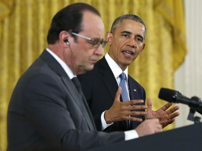 French President Francois Hollande (L) addresses a joint news conference with U.S. President Barack Obama in the East Room of the White House in Washington November 24, 2015.  REUTERS/Jonathan Ernst