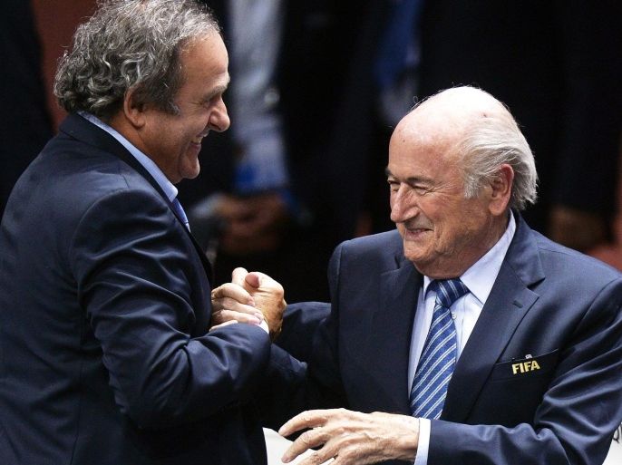 (FILE) A file picture dated 29 May 2015 of FIFA President Joseph Blatter (R) being congratulated by UEFA President Michel Platini (L) after his election as FIFA president during the 65th FIFA Congress in Zurich, Switzerland. FIFA president Joseph Blatter and UEFA president Michel Platini have lost their appeals against 90-day provisional suspensions from all football activities. FIFA's appeals committee on 18 November 2015 rejected the appeals and confirmed provisional suspensions imposed last month by the world governing body's ethics committee. EPA/WALTER BIERI *** Local Caption *** 52296677