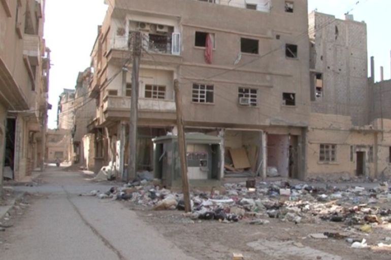 أحد الأحياء التي يسيطر عليه النظام السوري داخل مدينة دير الزور