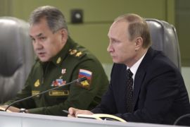 Russian President Vladimir Putin (R) with Defence Minister Sergei Shoigu attend a meeting on Russian air force's activity in Syria at the national defence control centre in Moscow, Russia, November 17, 2015. Russia said on Tuesday it had stepped up air strikes against Islamist militants in Syria with long-range bombers and cruise missiles after the Kremlin said it wanted retribution for those responsible for blowing up a Russian airliner over Egypt. REUTERS/Alexei Nikolskyi/SPUTNIK/Kremlin ATTENTION EDITORS - THIS IMAGE HAS BEEN SUPPLIED BY A THIRD PARTY. IT IS DISTRIBUTED, EXACTLY AS RECEIVED BY REUTERS, AS A SERVICE TO CLIENTS.