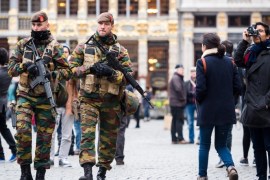 Belgian Army soldiers patrol in the picturesque Grand Place in the center of Brussels on Friday, Nov. 20, 2015. Salah Abdeslam, a French national who lived in Molenbeek, Belgium, is currently the subject of an international manhunt after the Paris attacks. Security has been stepped up in parts of Belgium as a precaution. (AP Photo/Geert Vanden Wijngaert)