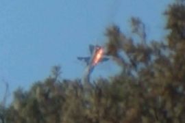 A war plane crashes in flames in a mountainous area in northern Syria after it was shot down by Turkish fighter jets near the Turkish-Syrian border November 24, 2015. Turkish fighter jets shot down a Russian-made warplane near the Syrian border on Tuesday after repeatedly warning it over air space violations, Turkish officials said, but Moscow said it could prove the jet had not left Syrian air space. Turkish presidential sources said the warplane was a Russian-made SU-24. Turkey's military, which did not confirm the plane's origin, said it had been warned 10 times in the space of five minutes about violating Turkish airspace. Russia's defence ministry said one of its fighter jets had been downed in Syria, apparently after coming under fire from the ground, but said it could prove the plane was over Syria for the duration of its flight, Interfax news agency reported. REUTERS/Sadettin Molla ATTENTION EDITORS - FOR EDITORIAL USE ONLY. NOT FOR SALE FOR MARKETING OR ADVERTISING CAMPAIGNS. NO RESALES. NO ARCHIVE TPX IMAGES OF THE DAY