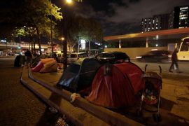 A view shows tents at a makeshift camp on a street where Ehab Ali Naser, a 23 year-old Syrian refugee, lives, in northern Paris, France, September 16, 2015. Ehab, in Paris for a month, arrived after an 18-month journey that started in his hometown of Homs, Syria, where he was a vendor at the souk. He spent a year in Lebanon, then travelled to Algeria and Morocco before he arrived in the Spanish port of Melila, and then headed to France. Currently he lives in a tent in a small refugee camp along a busy boulevard on the outskirts of Paris. Ehab has always dreamt of becoming a singer and one day his path crosses with that of a French producer, writer and composer visiting the refugee camp at Porte de Saint Ouen, who gives him the chance to try out his voice in a professional music studio. Picture taken September 16, 2015. REUTERS/Eric Gaillard