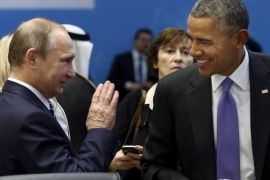 FILE - In this Monday, Nov. 16, 2015 file photo, U.S. President Barack Obama, right, talks with Russian President Vladimir Putin, left, prior to a session of the G-20 Summit in Antalya, Turkey. The tide of global rage against the Islamic State group lends greater urgency to ending the jihadis’ ability to operate at will from a base in war-torn Syria. That momentum could also force a reevaluation of what to do about President Bashar Assad’s future and puts a renewed focus on the position of his key patrons, Russia and Iran. (Kayhan Ozer/Anadolu Agency via AP, Pool, File)