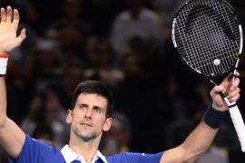MS653 - Paris, Paris, FRANCE : Serbia's Novak Djokovic celebrates after winning his semi-final tennis match against Switzerland's Stan Wawrinka at the ATP World Tour Masters 1000 indoor tennis tournament in Paris on November 7, 2015. AFP PHOTO / MIGUEL MEDINA