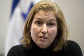 epa04513112 Israeli Minister of Justice Tzipi Livni leader of Hatnuah (Movement) Party, during a faction meeting of the party at the Knesset, the Israeli parliament, in Jerusalem, Israel, 03 December 2014. Israeli lawmakers were expected to vote on a bill dispersing parliament and setting 17 March 2015 as the date for early elections after Prime Minister Benjamin Netanyahu's coalition government unraveled over disagreement on key policies. Netanyahu said a day earlier he was no longer able to lead his strained coalition just two years after it took office. He fired two centrist ministers opposed to his policies. EPA/ABIR SULTAN