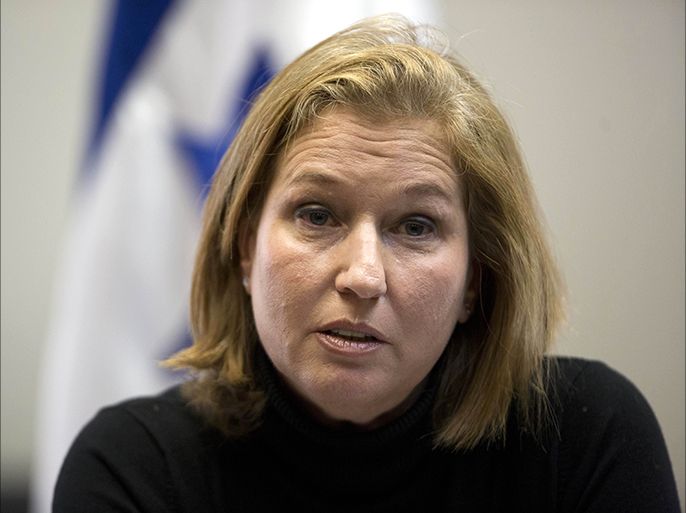 epa04513112 Israeli Minister of Justice Tzipi Livni leader of Hatnuah (Movement) Party, during a faction meeting of the party at the Knesset, the Israeli parliament, in Jerusalem, Israel, 03 December 2014. Israeli lawmakers were expected to vote on a bill dispersing parliament and setting 17 March 2015 as the date for early elections after Prime Minister Benjamin Netanyahu's coalition government unraveled over disagreement on key policies. Netanyahu said a day earlier he was no longer able to lead his strained coalition just two years after it took office. He fired two centrist ministers opposed to his policies. EPA/ABIR SULTAN