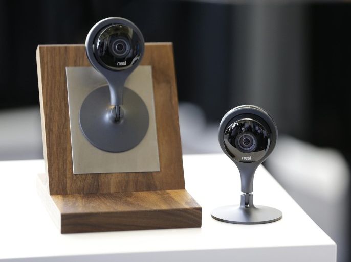 The latest Nest Cam surveillance video camera is on display following a news conference Wednesday, June 17, 2015, in San Francisco. Google's Nest Labs is releasing new versions of its surveillance video camera and talking smoke detector as part of its attempt to turn homes into yet another thing that can be controlled and tracked over the Internet. (AP Photo/Eric Risberg)