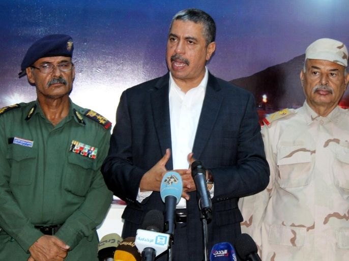 Yemeni Prime Minister Khaled Bahah (C) speaks to media during a news conference four days after he and members of his government escaped unhurt from car bomb attacks in the southern port city of Aden, Yemen, 10 October 2015. Islamic State has claimed responsibility for attacking on 06 October the Aden-based temporary headquarters of Yemens Saudi-backed government and buildings used by the Saudi-led coalition forces in Aden, killing four Emirati troops and a number of local militiamen.