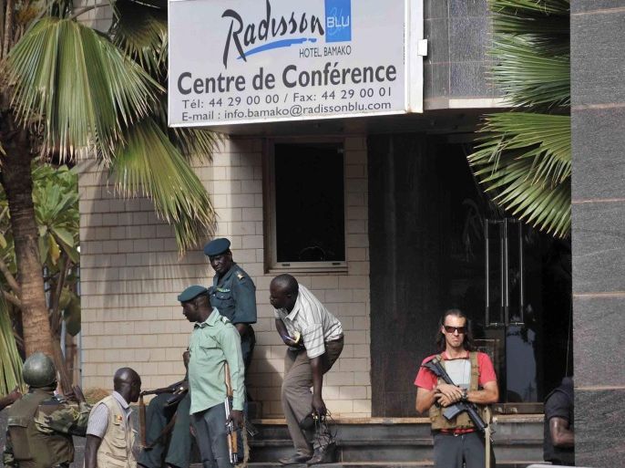 Security forces surround the Radisson Hotel during a hostage situation, Bamako, Mali, 20 November 2015. Twenty people were killed when Malian special forces stormed a Bamako hotel seized by suspected Islamists, the UN peacekeeping mission to the West African country said, while the government announced that there were no more hostages in terrorist hands. All the 170 hostages held at the Radisson Blu hotel have been released or escaped.