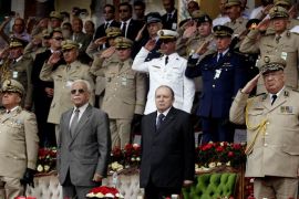 Algeria's President and head of the Armed Forces Abdelaziz Bouteflika (2nd R), Army Chief of Staff General Ahmed Gaid Salah(R) and Abdelmalek Guenaizia (2nd L), Minister Delegate to the Defence ministry attend a graduation ceremony of the 40th class of trainee army officers at a Military Academy in Cherchell 90 km west of Algiers June 27 ,2012.REUTERS/Ramzi Boudina(ALGERIA - Tags: POLITICS MILITARY)