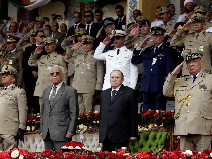 Algeria's President and head of the Armed Forces Abdelaziz Bouteflika (2nd R), Army Chief of Staff General Ahmed Gaid Salah(R) and Abdelmalek Guenaizia (2nd L), Minister Delegate to the Defence ministry attend a graduation ceremony of the 40th class of trainee army officers at a Military Academy in Cherchell 90 km west of Algiers June 27 ,2012.REUTERS/Ramzi Boudina(ALGERIA - Tags: POLITICS MILITARY)